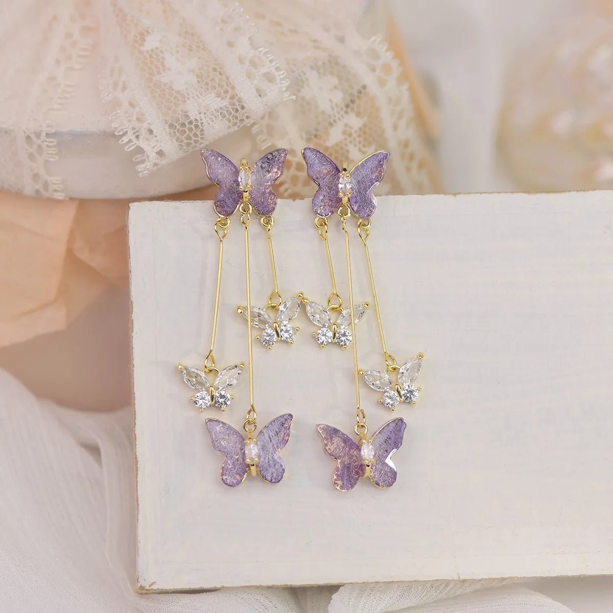 Elegant Butterfly Tassel Earrings – 925 Silver Sparkle